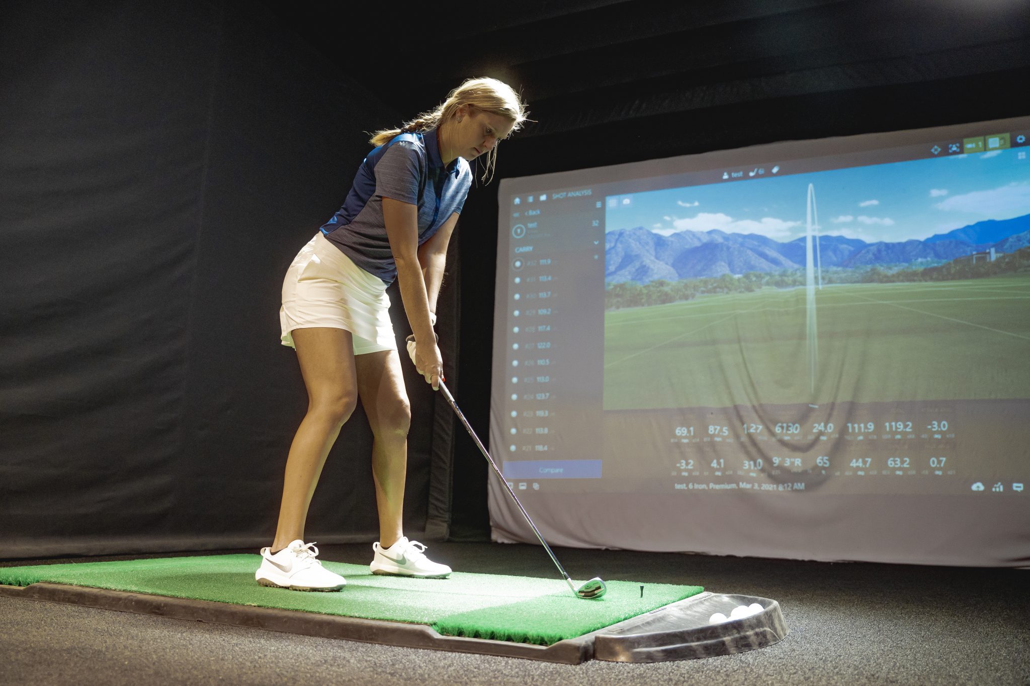 female golfer fitting